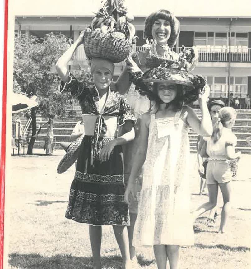 Historic photograph of Risidale learners wearing creative hats
